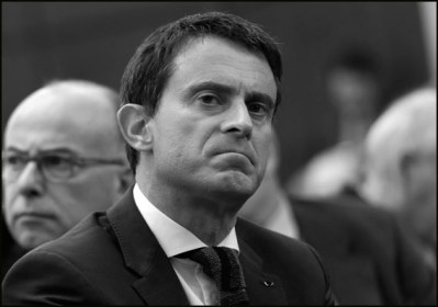 Nathalie Appere, Bernard Cazeneuve and Manuel Valls. French Prime minister Manuel Valls and French Interior minister, Bernard Cazeneuve during an information meeting on the reception of refugees. Paris, FRANCE-12/09/2015
