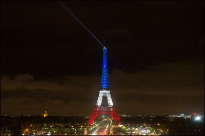 The Eiffel Tower is illuminated in France's red, white and blue national colors in honor of the 129 victims of last friday's terrorist attacks in the capital. Paris, FRANCE-15/11/2015