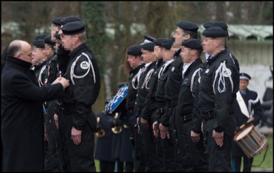 Bernard Cazeneuve . French Interior Minister Bernard Cazeneuve and RAID Commander Jean-Michel Fauvergues during a ceremony at the RAID training center in Bievres. Bières, FRANCE-18/02/2016