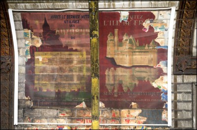 Portions of the original ceramic tiling as well as vintage signs and posters  can be seen at the Trinite d’Estienne d’Orves station on metro line 12 prior to renovation scheduled to begin in October. Paris, FRANCE-10/03/2016
