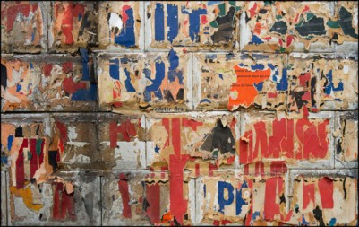 Portions of the original ceramic tiling as well as vintage signs and posters  can be seen at the Trinite d’Estienne d’Orves station on metro line 12 prior to renovation scheduled to begin in October. Paris, FRANCE-10/03/2016