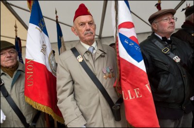 Francois Hollande. French President Francois Hollande and Defence Minister Jean-Yves Le Drian attend  a ceremony of commemoration of the end of the Algerian war (1954 to 1962). .Paris, FRANCE-19/03/2016