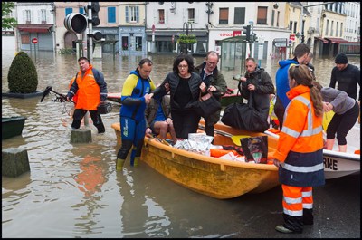 Rescuers ride a boat during a rescue operation in a flooded area of Nemours, some 80km south of Paris. Nemours, FRANCE-2/06/2016