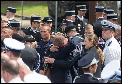 Policemen crying. French President Francois Hollande, Prime Minister Manuel Valls and French Interior minister, Bernard Cazeneuve during a memorial ceremony honouring the police couple who were killed by an extremist pledging allegiance to the Islamic State group. Versailles, FRANCE-17/06/2016