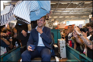 Emmanuel  Macron having his beard shaved off. Former French Economy Minister and founder of the political movement "En Marche" (On the Move), Emmanuel Macron visiting the MCB, unique and professionnal event devoted to the beauty business, Hair and beauty, aesthetic, make-up and nails. Paris, France 12/09/2016