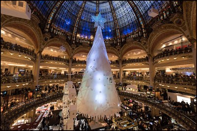 The 2016 Christmas tree at Galeries Lafayette Haussmann. Paris, FRANCE-26/11/2016